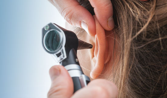 Your patient getting an ear exam